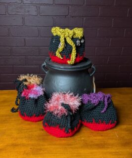 90107 - Laurie Loops - sisterhood cauldron satchel